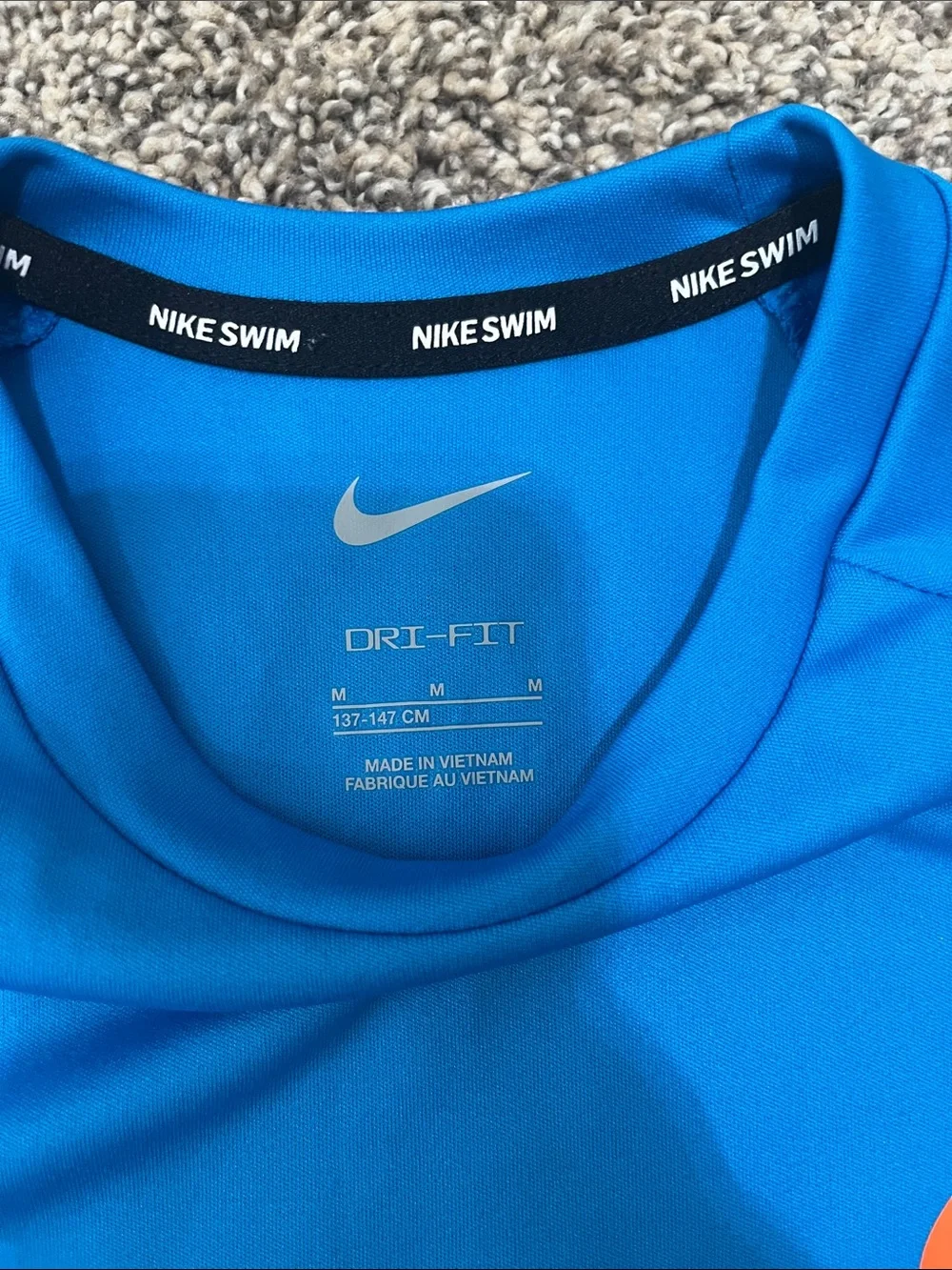 Nike Swim Blue Dri-FIT Tee with Orange & Pink Swoosh